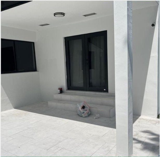 Freshly painted residential patio walls