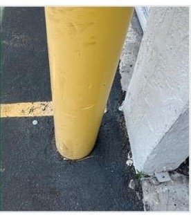 Damaged commercial bollard